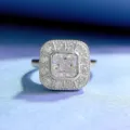 Close-up of 925 silver square simulated diamond ring with stunning halo setting. - Size 5 / White