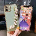 Green electroplated phone case with elegant pearl chain strap for iPhone models, stylish design. - iPhone XR / Electroplated Light Green With Pearl Chain