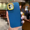 Detailed view of the blue liquid silicone phone case with yellow camera frame protection. - iPhone 7/8 Plus / Blue