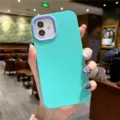 Liquid silicone phone case detail view, mint green with purple camera frame for iPhone series. - Mint Green