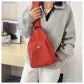 Rote Mini Nylon Umhängetasche Brusttasche für Damen, multifunktionaler Freizeit Rucksack. - Orange