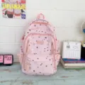 Pink star pattern school backpack for teen girls, large capacity casual daypack for school. - Pink