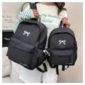 Japanese style sweet black school backpack with cute white bow for student daily casual use. - S / Black