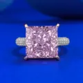 Detailed shot of a stunning 10x10mm princess cut pink diamond ring with micro pave band - Size 9 / Pink