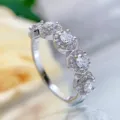Detailed close-up view of a sparkling S925 silver ring, elegant multi-stone halo design. - Size 5 / White