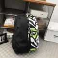 Trendy color-block backpack for students, large capacity casual oxford school bag. - Hanging Charm Style / Green With Pendant