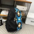 Stylish black and blue patchwork backpack with geometric pattern and astronaut pendant for daily use. - Hanging Charm Style / Blue With Charm