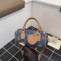 Stylish denim pillow bag for women, trendy contrast color bow print shoulder handbag. - Dark Blue Bowknot