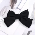 Pinza de pelo grande con lazo de tela negra, diseño elegante para peinado diario de mujeres. - Pinza de pelo negra
