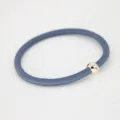 Minimalist blue hair tie with a small golden bead elastic hair band for daily styling. - Denim Blue