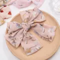 Chiffon floral bow hair clip detail shot, sweet style spring hairpin for charming looks. - Premium Korean Pink Floral