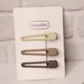 Detailed view of three minimalist matte hair clips in milk tea colors on a display card. - 3 Pieces/Pack / Three Clips - Pointed Milk Tea Series