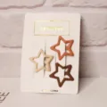 Close-up view of three milk tea colored hollow star hair clips on white card display. - 3 Pieces/Pack / Three Clips Short Star - Milk Tea