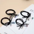 Chic black hair ties with crystal flower charms, elegant elastic ponytail holders for women. - Knotted Crystal Flower Multicolor Mixed Style