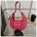Trendy hot pink crescent shoulder bag for women, stylish underarm purse with elegant metal clasp. - Rose Red