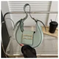 Light green crescent underarm shoulder bag for women, trendy niche bag with metal buckle. - Light Green