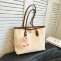 Retro large capacity PU leather tote bag with brown trim and pink furry charm for women daily. - White With Pendant
