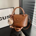 Retro brown PU leather top handle crossbody bag for women, stylish vintage daily shoulder bag. - Light Brown With Pendant