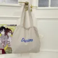 Beige canvas drawstring tote bag student commuter lightweight shoulder handbag with blue letters. - Khaki