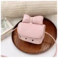 Süße rosa Umhängetasche für Kinder mit Schleife und Punkten, stylische PU-Leder Handtasche. - Rosa