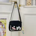 Nouvelle sacoche de téléphone ins mignonne et élégante 2025, sac bandoulière décontracté léger. - Avec Pendentif / Noir