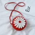 Cute red PU round crossbody bag for kids with white daisy flower detail and long strap. - Red