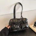 Black glossy bowling shoulder bag with double straps and bow pockets for women and daily use. - Without Pendant / Black