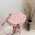 Pink shell shoulder bag for women, trendy pearl chain crossbody bag with stylish design. - Pink
