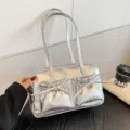Silver metallic bowling shoulder bag with double bow front pockets, stylish daily handbag. - Without Pendant / Silver