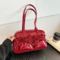 Red patent leather bowling handbag with double handles and stylish front bow pockets for women. - Without Pendant / Red
