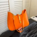 Orange shoulder bag for women, stylish PU leather hobo handbag with chic chain and lock. - Yellow Brown