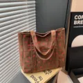 Brown corduroy tote bag with cute red strawberry print, large capacity shoulder bag for daily use. - Coffee