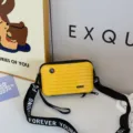 Mini suitcase crossbody bag for women, stylish hard shell shoulder box handbag with strap. - Yellow