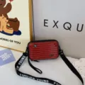 Mini suitcase crossbody bag for women, stylish hard shell shoulder bag with wide strap. - Burgundy