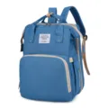 Sac à dos à langer bleu multifonctionnel avec grand espace de rangement et tissu résistant. - Bleu
