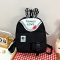 Mochila negra bonita para niños con orejas de conejo y bolsillo frontal, bolso escolar. - Talla única / Negro