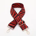 Red black zebra pattern wide bag strap with gold metal hardware adjustable replacement. - Style Number 224