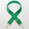 Green replacement bag strap featuring Greek key woven pattern and gold-tone hardware. - No. 787 (787)