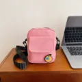 Pink canvas crossbody bag for women, cute small shoulder bag with front pocket for daily use. - One Size / Pink