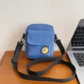 Blue canvas crossbody bag for women, cute small shoulder bag with front pocket and patch. - One Size / Blue