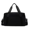 Sac de voyage noir pour sport, trajet et courts séjours avec fond à motifs carrés. - Noir