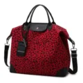 Red leopard print travel duffel bag, large capacity weekender bag with black leather handles. - Leopard Rose Red
