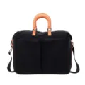 Black travel duffel bag with orange handles, large capacity shoulder bag for daily commuting. - Black/Orange