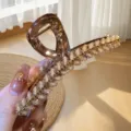 Close-up of large rhinestone hair claw clip, sparkling beaded design, elegant hair accessory detail. - Fashion Wheat Ear Style (D28-1) / Coffee