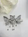 Pince à cheveux papillon en cristal exquise avec détails de franges de strass brillants et élégants. - Grande Pince Bec de Canard Gland Double Papillon / Blanc