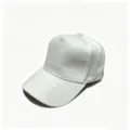 Detail view of the plain white baseball cap, showing solid cotton fabric and curved brim. - 58CM Adjustable / White