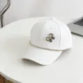 White children baseball cap with rhinestone bow and chain detail casual sun hat detail - 54cm Adjustable / White