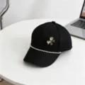 Black kids baseball cap detail showcasing sparkly rhinestone chain and elegant crystal bow. - 54cm Adjustable / Black