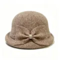 Detail view of a French retro brown wool blend bucket hat featuring a sparkling rhinestone bow. - M (56-58cm) / Khaki