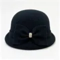 Detail view of black wool blend cloche hat with elegant bow and sparkling rhinestone buckle. - M (56-58cm) / Black